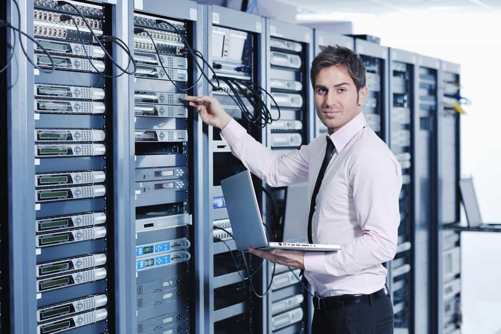 young handsome business man  engeneer in datacenter server room-2